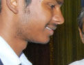 Mr.Purusothaman, NASSCOM, Chennai congratulating a Student