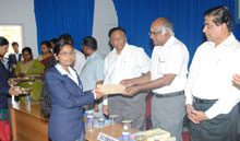 Dr. B. Viswanathan distributes a scholarship
